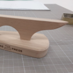 thumbnail image of point presser on cutting mat